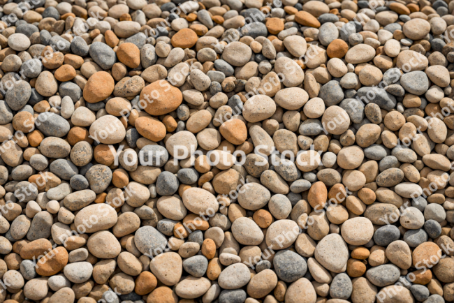 Stock Photo of Rocks on the beach sunny day pattern no seamless