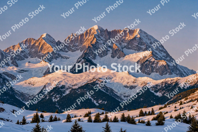 Stock Photo of Incredible mountain with snow at sunset