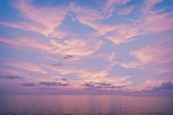 Stock Photo of Sea ocean clouds sunset relaxing zen pink scene