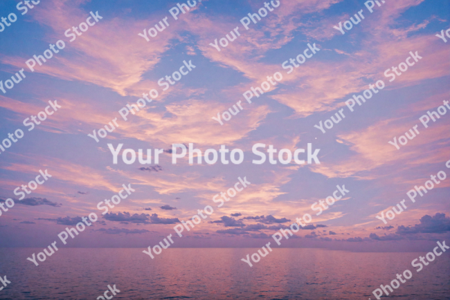 Stock Photo of Sea ocean clouds sunset relaxing zen pink scene