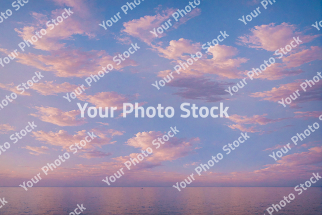 Stock Photo of Cloud in the sky pink relaxing in the ocean sea outdoor sunset