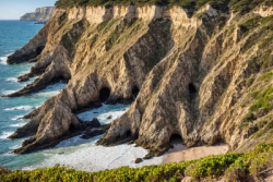 Stock Photo of Cliff rocks nature on the the sea coast