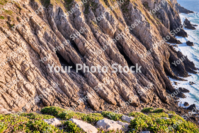 Stock Photo of Nature cliff rocks in the coast sea