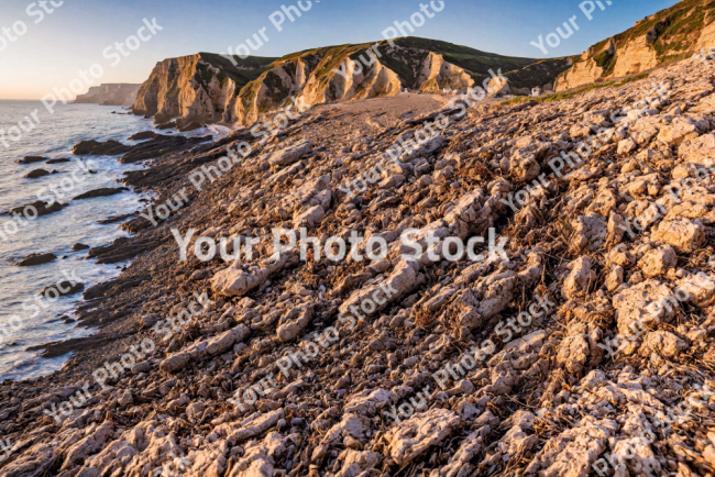 Stock Photo of Rocks landscape in the coast sunset landscape