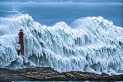 Stock Photo of Lighthouse in the storm and the sea ocean
