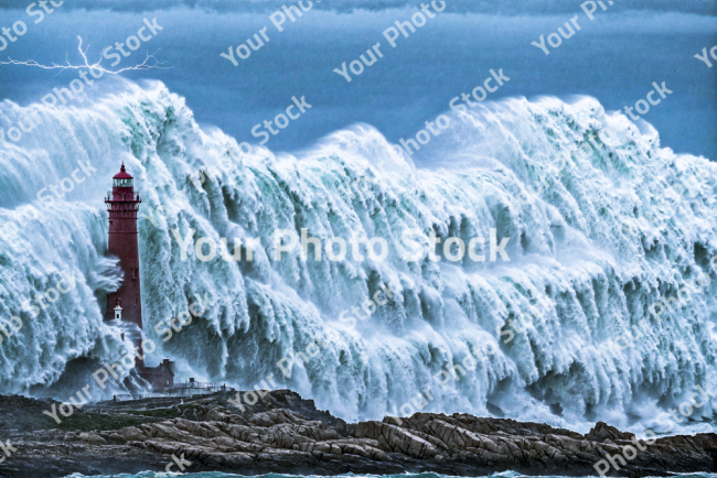 Stock Photo of Lighthouse in the storm and the sea ocean