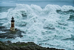 Ocean sea hurrican lighthouse in the storm