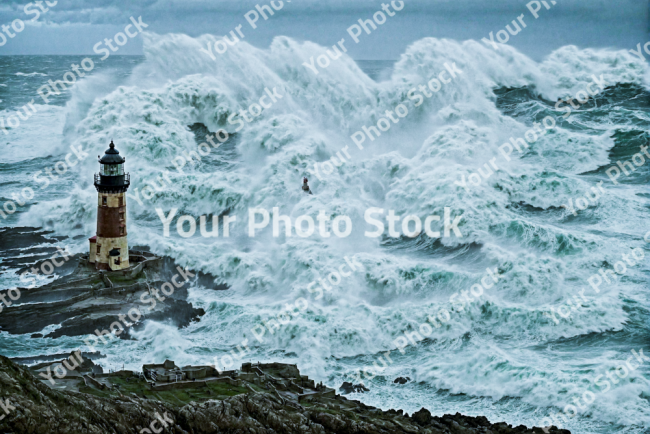 Stock Photo of Ocean sea hurrican lighthouse in the storm