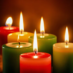 Stock Photo of Candles with fire light warm christmas decoration