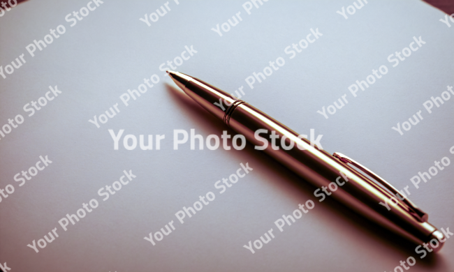 Stock Photo of Pencil writing on paper